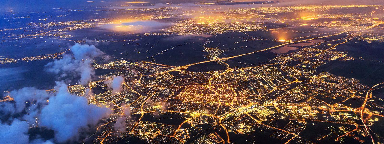A city lit up at night shown from high above